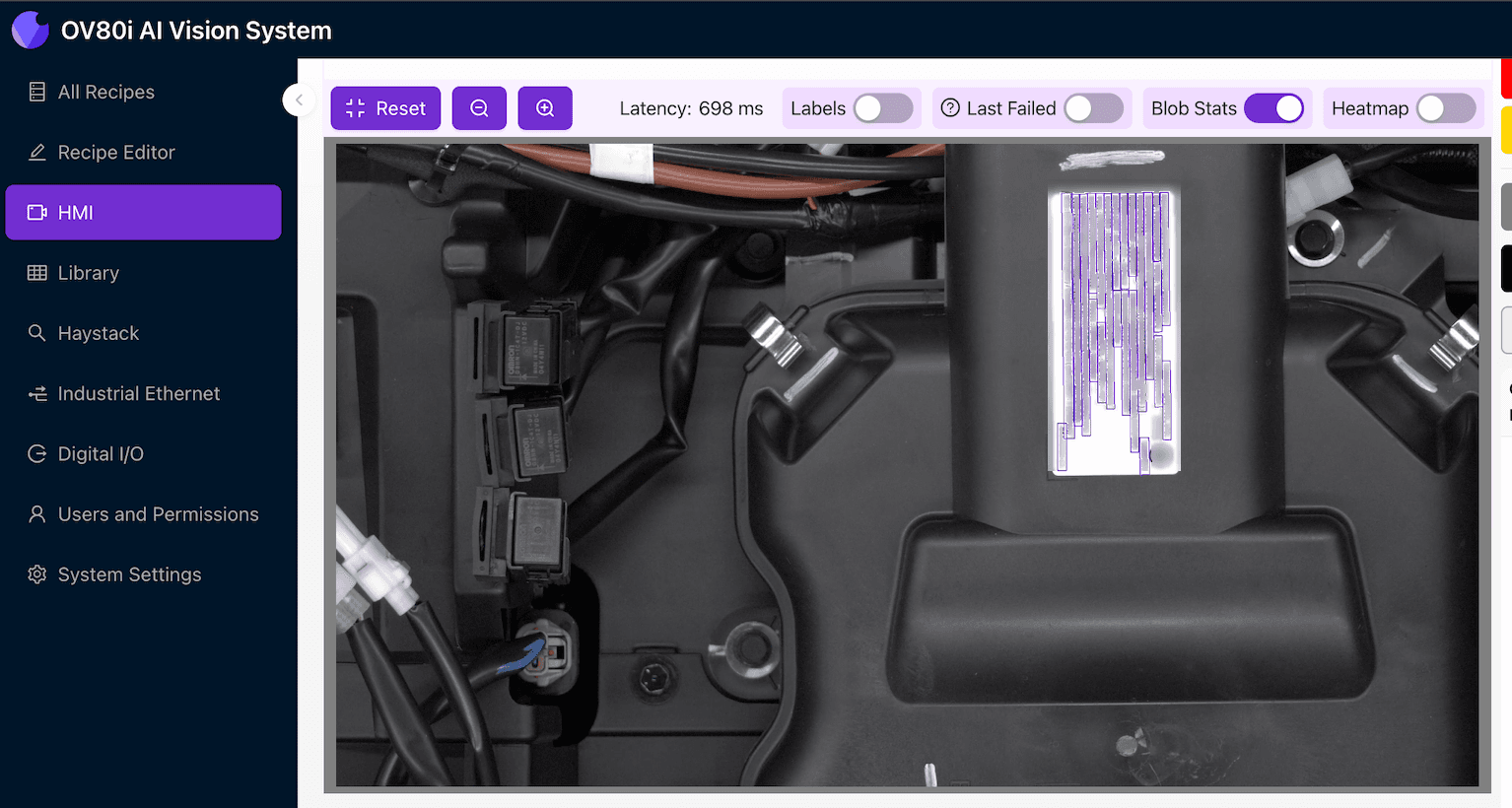 OV80i inspection screen with OCR detection regions drawn around every line of text on a printed compliance label